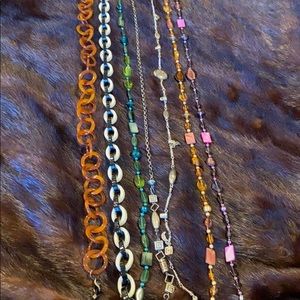 Lot of 7 eye glass holders. All unique